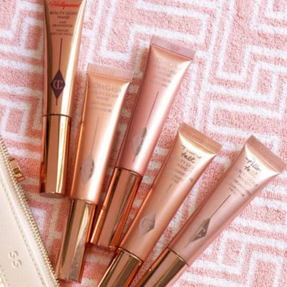 Charlotte Tilbury's Beauty Light Wand and Newer Unreal Blush Healthy Glow Stick